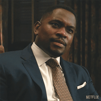 Man In Suit And Tie Waving Netflix GIF