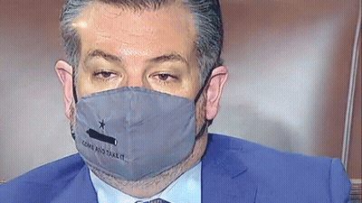 Man In Suit And Tie Wearing Flag Face Mask GIF