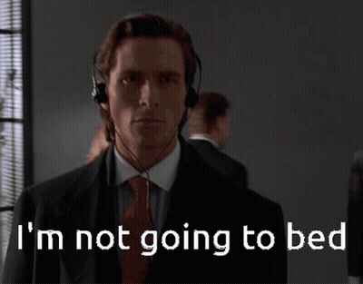 Man In Suit And Tie Wearing Headphones GIF