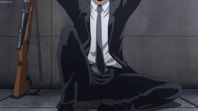 Man In Suit And Tie Wearing Mask GIF