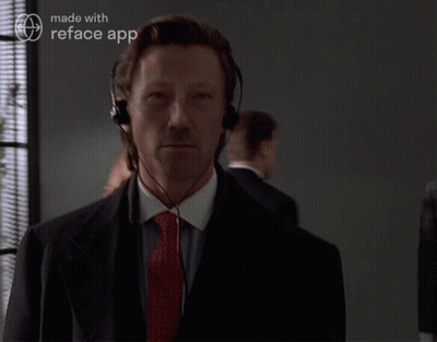 Man In Suit And Tie Wearing Reface App Headset GIF
