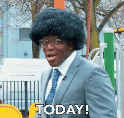 Man In Suit And Tie Wearing Wig And Glasses Saying Today GIF