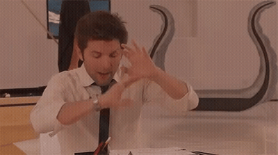Man In Suit And Tie With Arms Outstretched GIF
