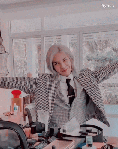Man In Suit And Tie With Arms Outstretched GIF
