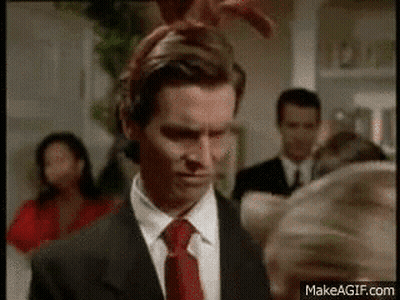 Man In Suit And Tie With Bunny Ears GIF
