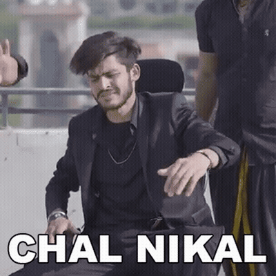 Man In Suit And Tie With Chal Nikal GIF
