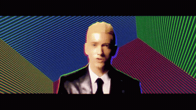 Man In Suit And Tie With Colorful Striped Background GIF
