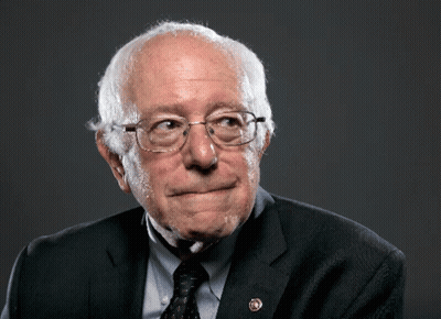 Man In Suit And Tie With Congressman Badge GIF