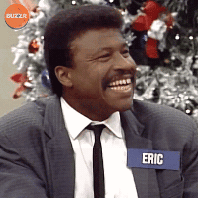 Man In Suit And Tie With Eric Name Tag GIF