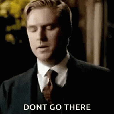 Man In Suit And Tie With Eyes Closed GIF