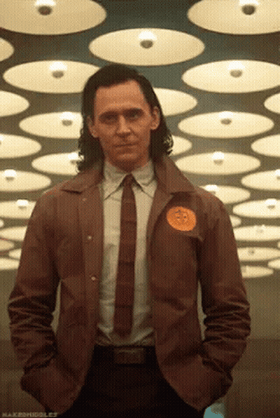 Man In Suit And Tie With Hands In Pockets GIF
