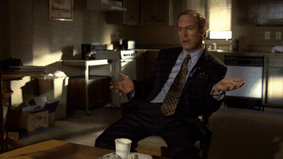 Man In Suit And Tie With Hands Outstretched GIF