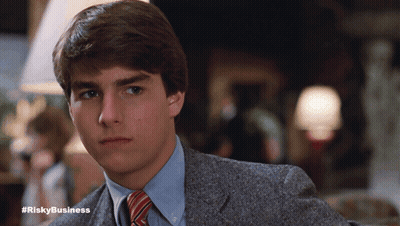 Man In Suit And Tie With Hashtag Riskybusiness GIF