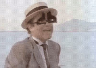 Man In Suit And Tie With Hat And Glasses GIF
