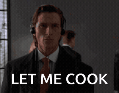 Man In Suit And Tie With Headset Saying Let Me Cook GIF