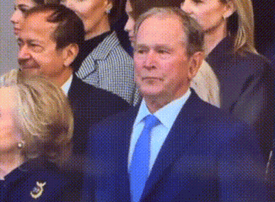 Man In Suit And Tie With Hillary Clinton And Group GIF