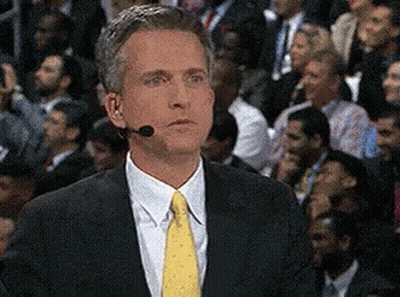 Man In Suit And Tie With Microphone GIF