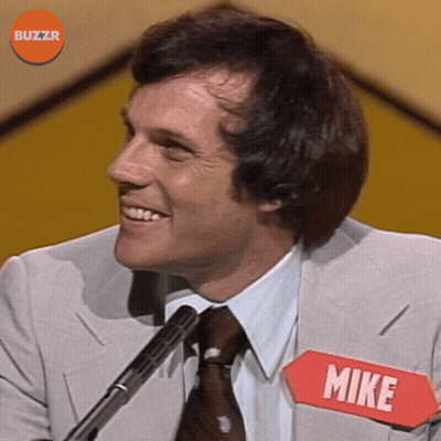 Man In Suit And Tie With Name Tag Mike GIF