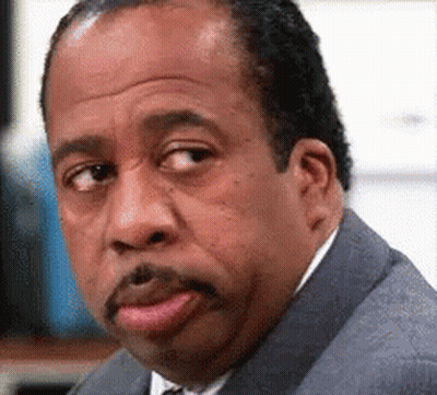 Man In Suit And Tie With NBC Logo GIF