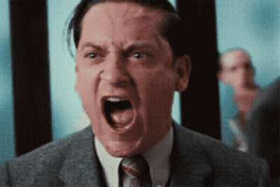 Man In Suit And Tie With Open Mouth GIF