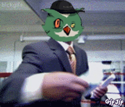 Man In Suit And Tie With Owl On Face GIF