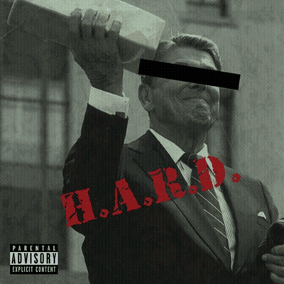 Man In Suit And Tie With Parental Advisory Label GIF