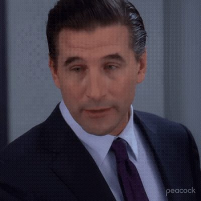 Man In Suit And Tie With Peacock GIF