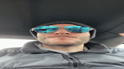 Man In Suit And Tie With Pixelated Cat On His Head Ellen GIF