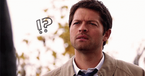 Man In Suit And Tie With Question Mark On Head GIF