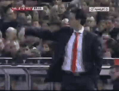 Man In Suit And Tie With Score Val 2-0 Vl 37031 GIF