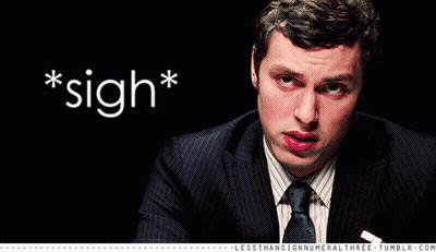 Man In Suit And Tie With Sigh GIF