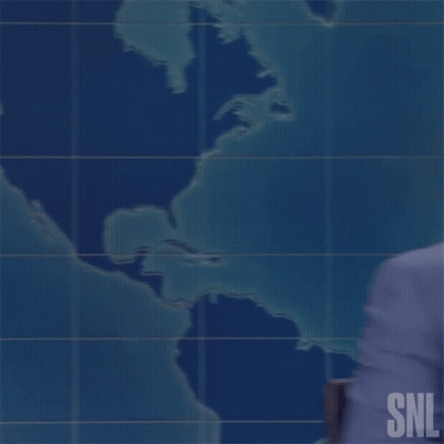 Man In Suit And Tie With SNL Logo GIF