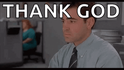 Man In Suit And Tie With Thank God On Screen GIF