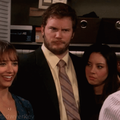 Man In Suit And Tie With Two Women GIF