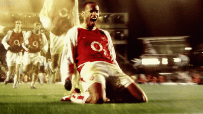 Man In Suit And Tie With UEFA Champions League Sign GIF