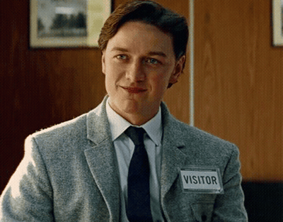Man In Suit And Tie With Visitor Name Tag GIF