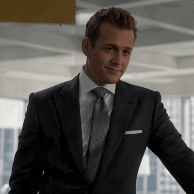Man In Suit And Tie With White Pocket Square GIF