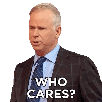 Man In Suit And Tie With Who Cares Sticker