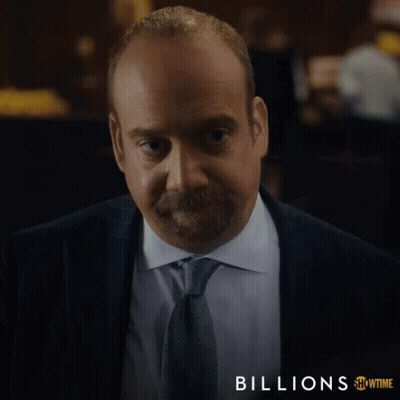 Man In Suit And Tie With Word Billions GIF