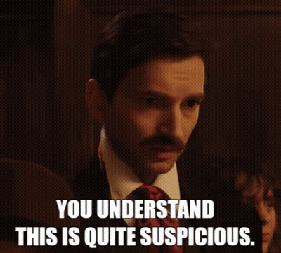 Man In Suit And Tie You Understand This Is Quite Suspicious GIF