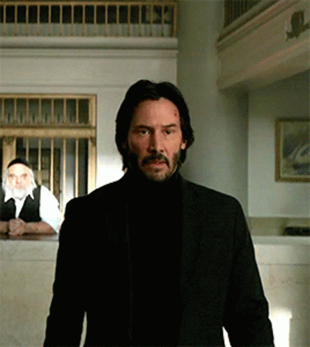 Man In Suit And Turtleneck GIF