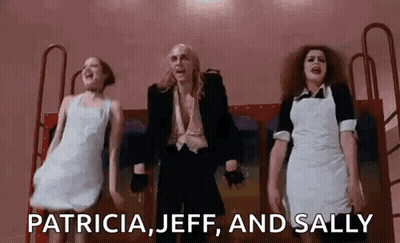 Man In Suit And Two Women Dancing GIF