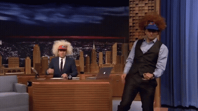 Man In Suit And Vest Dancing At Microphone GIF