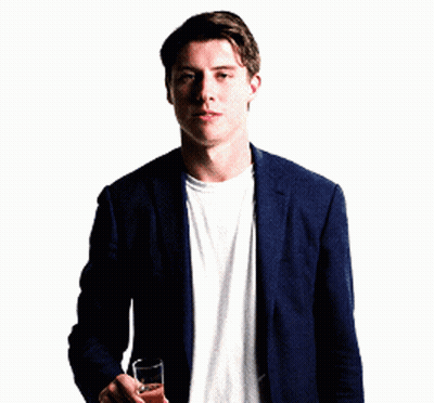 Man In Suit And White Shirt Holding Champagne GIF