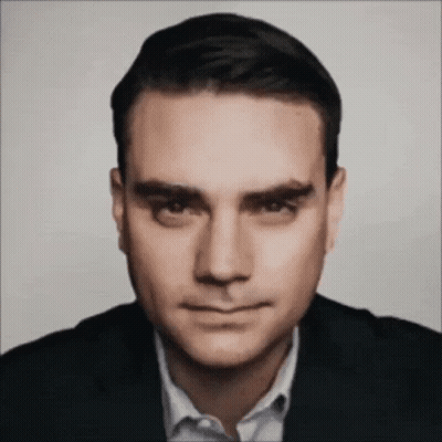 Man In Suit And White Shirt Looks Serious GIF