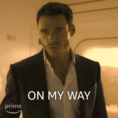 Man In Suit And White Shirt Saying On My Way GIF
