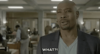Man In Suit And White Shirt Talking GIF