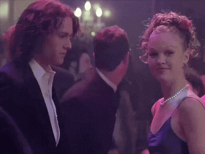 Man In Suit And Woman In Blue Dress Dancing GIF