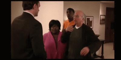 Man In Suit And Woman In Pink Jacket GIF