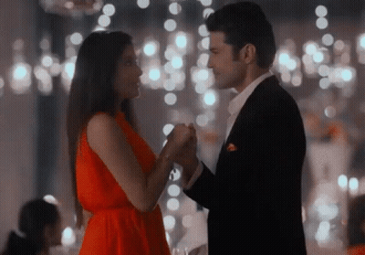 Man In Suit And Woman In Red Dress Dancing GIF